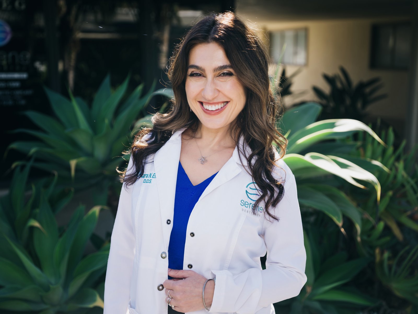 Dr. Klara N. Efner smiling outside Serene Dentistry in Ventura